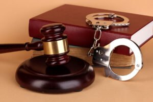 DUI Attorney MD - gavel, handcuffs, and book