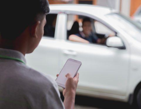 What To Do After An Uber Car Accident - customer ordering taxi via online apps